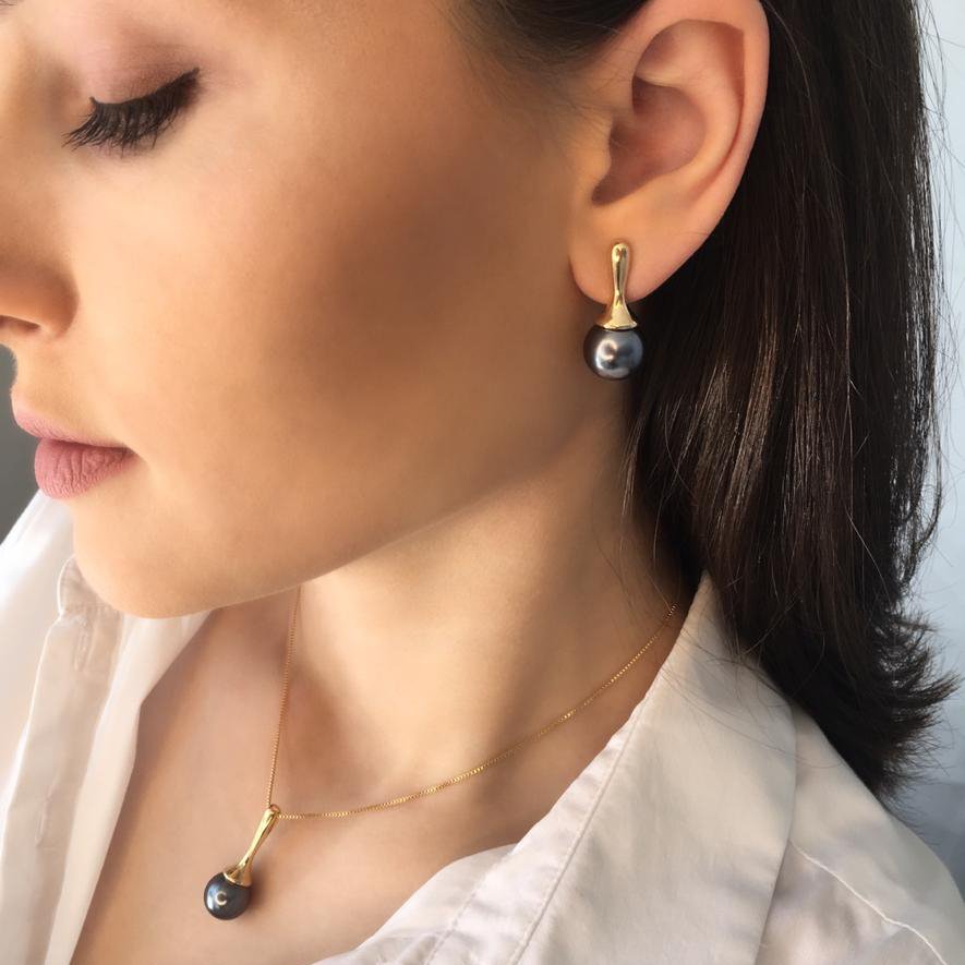 Ensemble radiant avec gemme sphérique et touche dorée