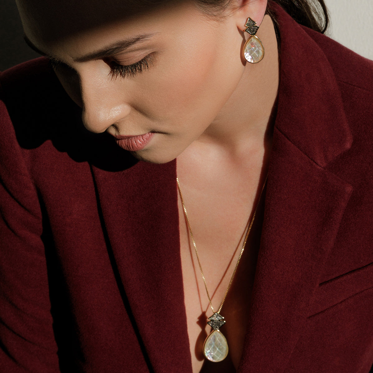 Ensemble doré avec rhodium noir et nacre