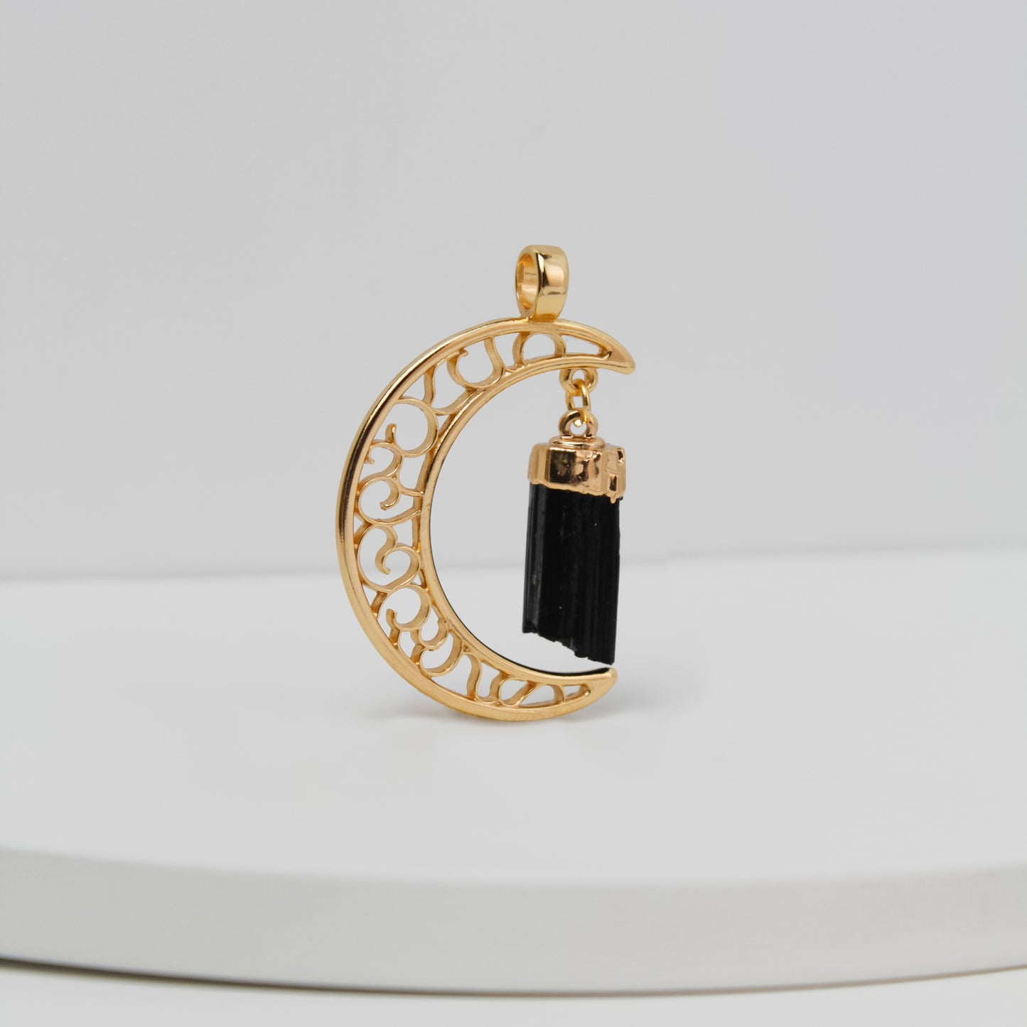 Pendentif lune ajourée avec cristal naturel